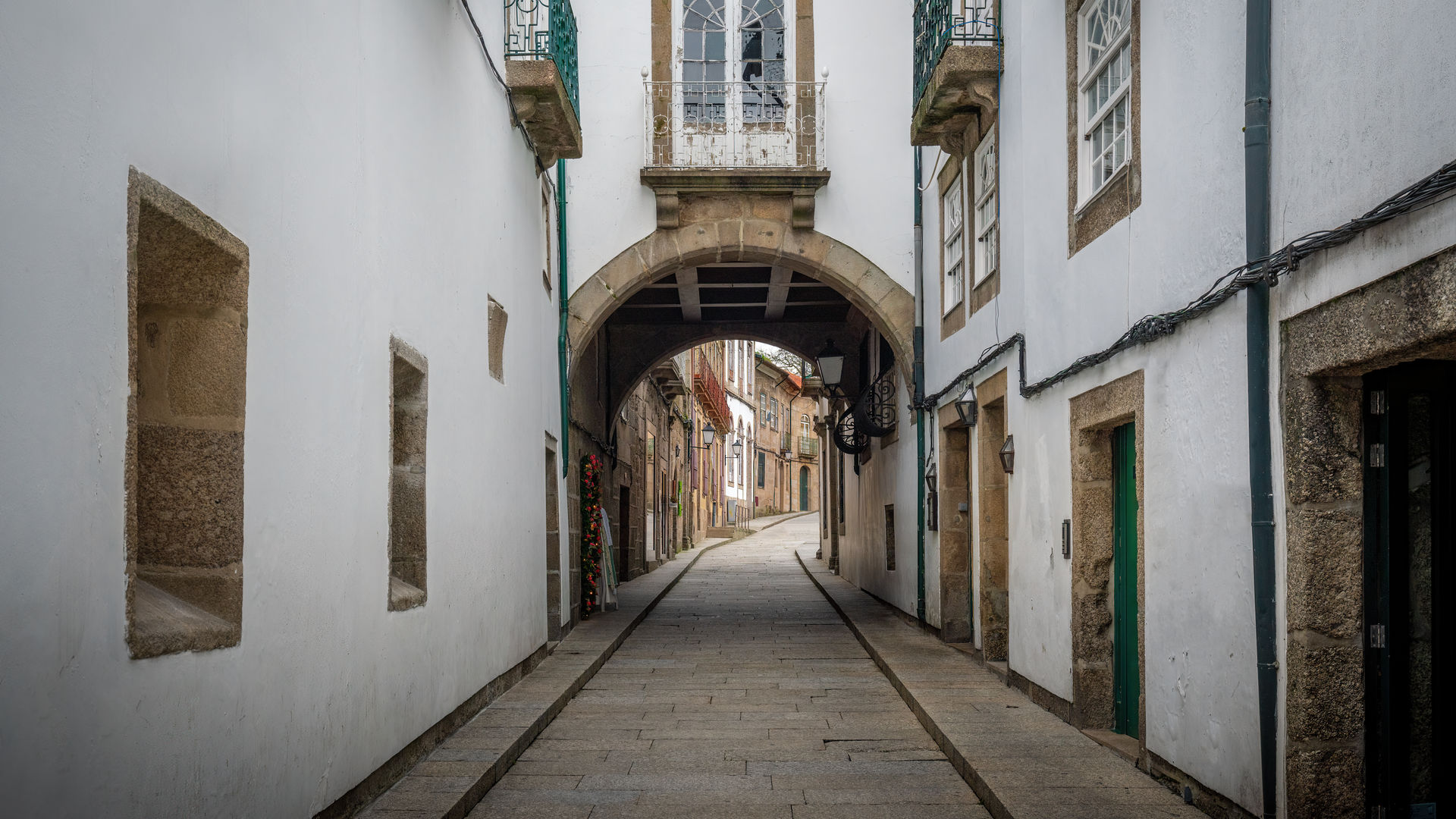 Arched house in the medieval street of Santa Maria, GuimarĂŁes