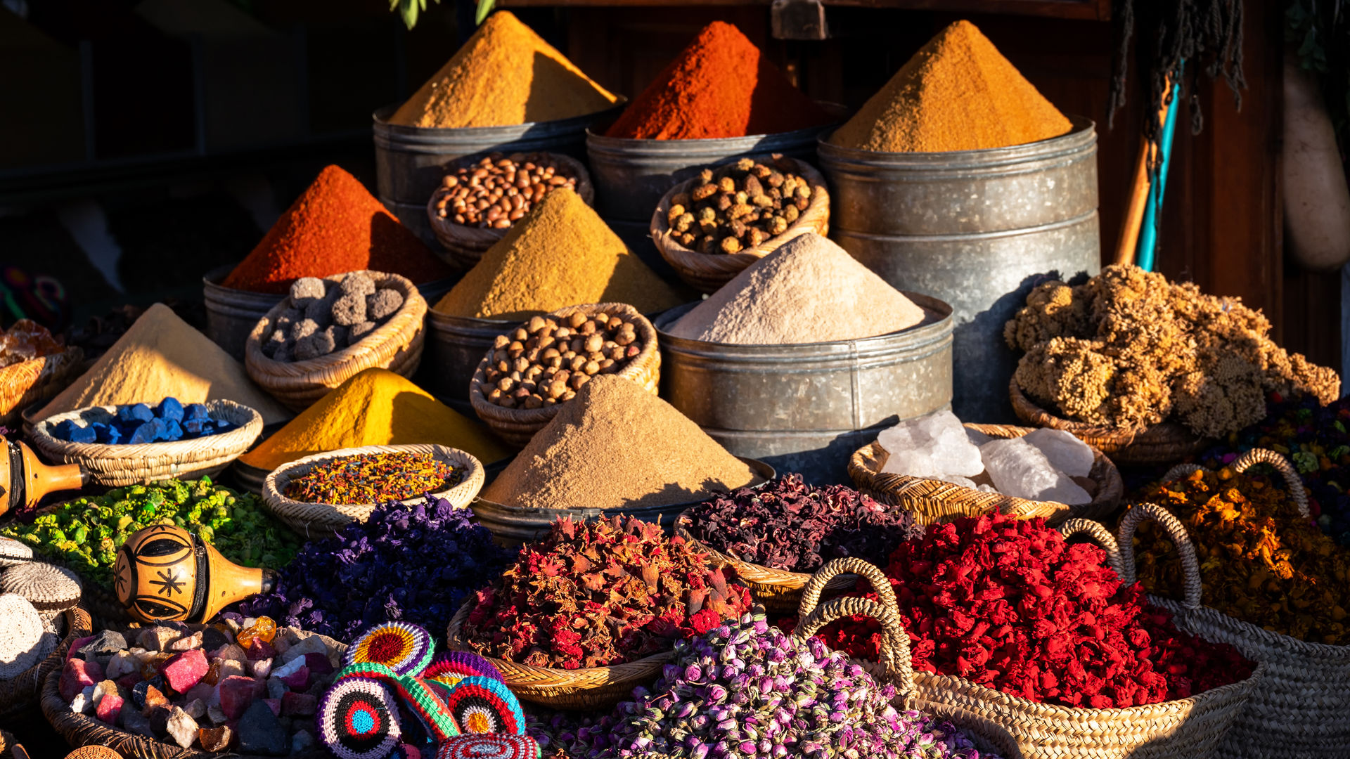 Spices, herbs, and dried flowers in a Marrakech souk