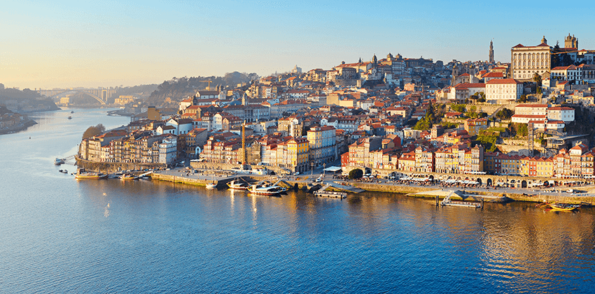 Portugal, Porto - Douro River With Oporto City in the Background