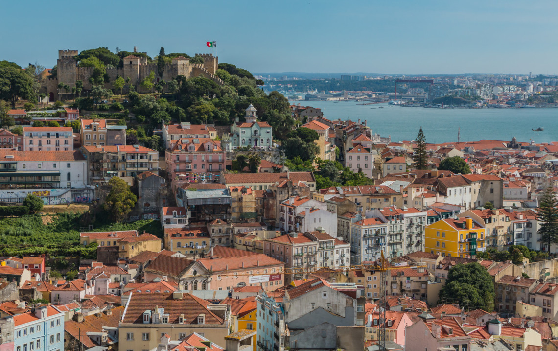 Skyline and cityscape of Lisbon, Portugal crowned by the São Jorge Castle.