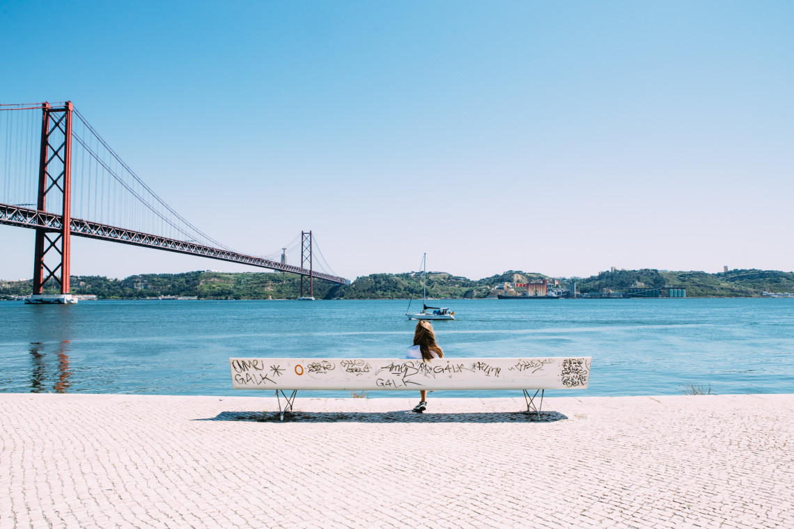 bridge-april25-river-lisbon-portugal-bench-boat