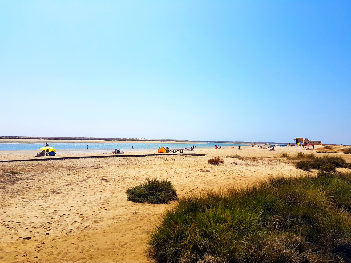 Ponta do Corvos Beach in Lisbon, Portugal beach-lisbon-paradise-white-sand-waves-sea-tourism-holidays-summer-travel-destination-portugal-tour-ocean-coastal-littoral-coastline-praia-da-ponta-dos-corvos
