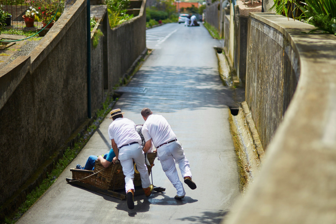 Toboggan Riders in Funchal, Madeira Island, Portugal Toboggan Riders in Funchal, Madeira Island, Portugal