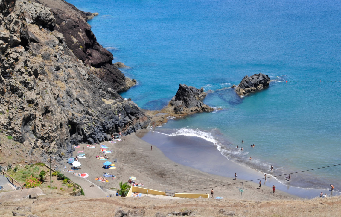 Secluded beach with people on Madeira Island,Portugal. Secluded beach with people on Madeira Island,Portugal.