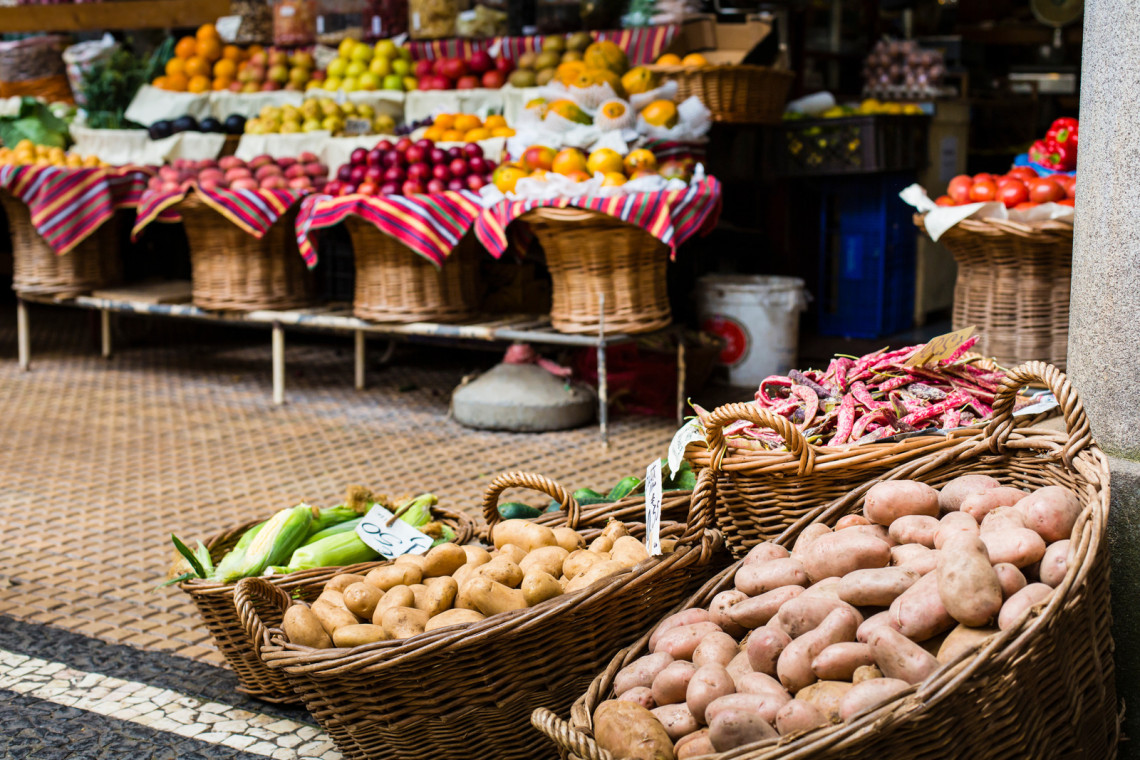 Mercado dos Lavradores fruit market in Funchal on Madeira island with various tropical fruits on display which are typical for the island.