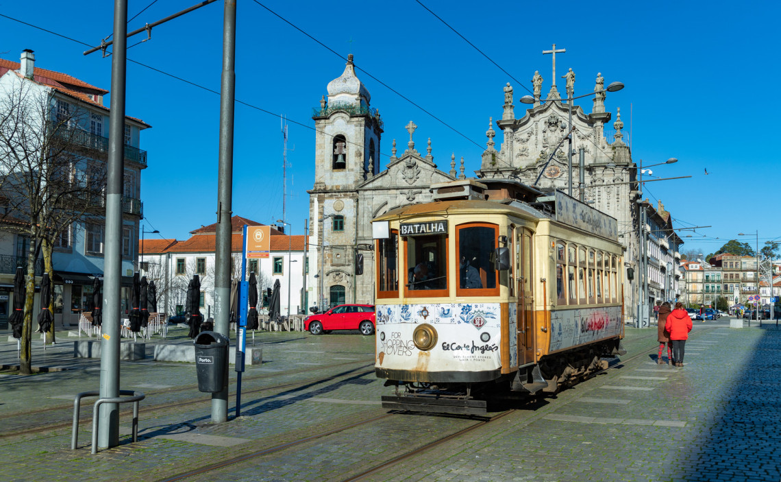 Tram in Oporto City, Portugal porto-portugal-oporto-city-tram-bus-transportation-trams-system-streets
