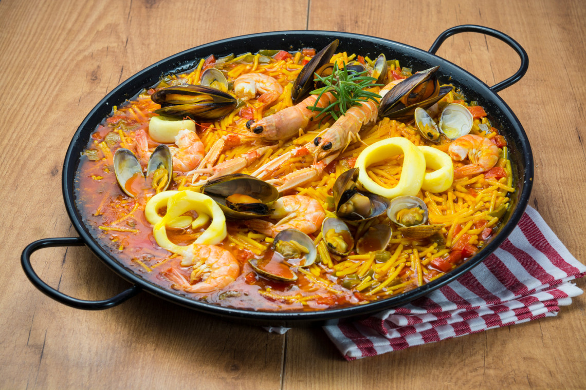 Fideuà, A Spanish Seafood Dish Originating in Valencia fidegua-paella-recipe-in-a-pan-with-shrimp-squid-and-seafood