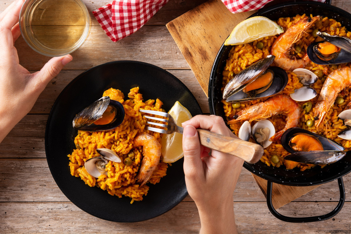 Seafood Paella, Barcelona, Spain traditional-spanish-seafood-paella-in-the-fry-pan-with-mussels-langoustine-and-fish
