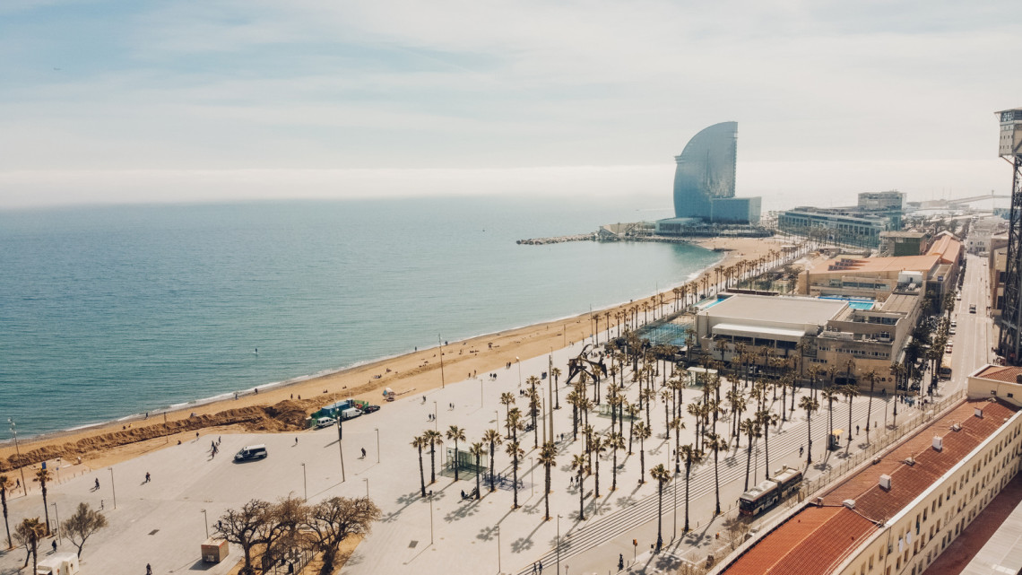 aerial-view-of-barceloneta-beach-barcelona-spain-travel-ocean-waves-sand-destination