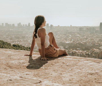 Woman Looking at Barcelona City View, Spain woman-looking-at-barcelona-spain-skyline-cityview