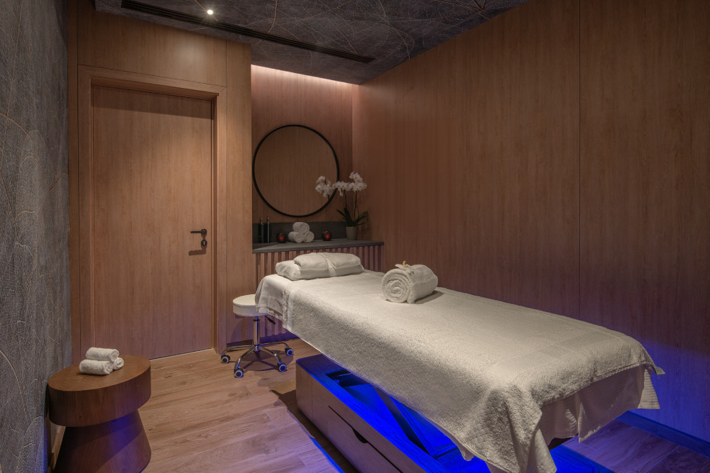 Modern massage room at Inala Spa with soothing lighting and wellness ambiance in São Miguel, Azores
