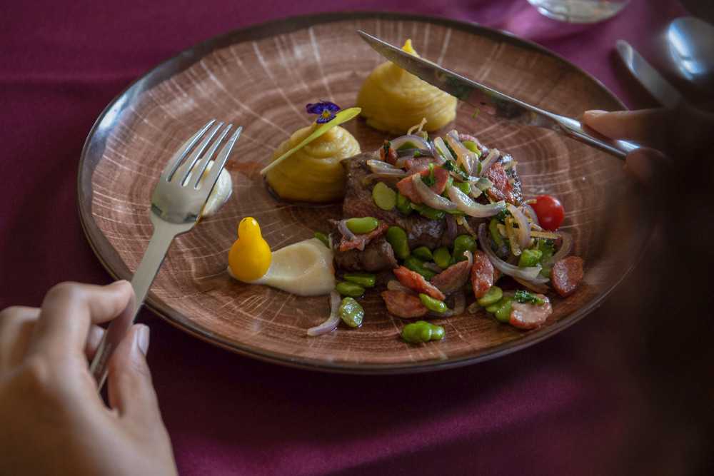 Gourmet dish served at Q.B. Restaurant in Terceira Island, Azores, featuring local ingredients and creative plating