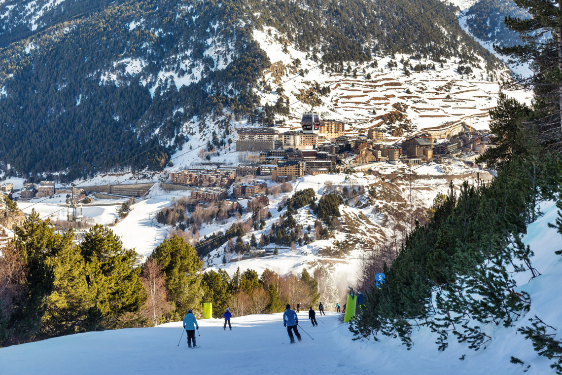 View of the village in the Pyrenees, Andorra from the ski slopes in winter view-of-the-village-in-the-pyrenees-andorra-from-the-ski-slopes-in-winter