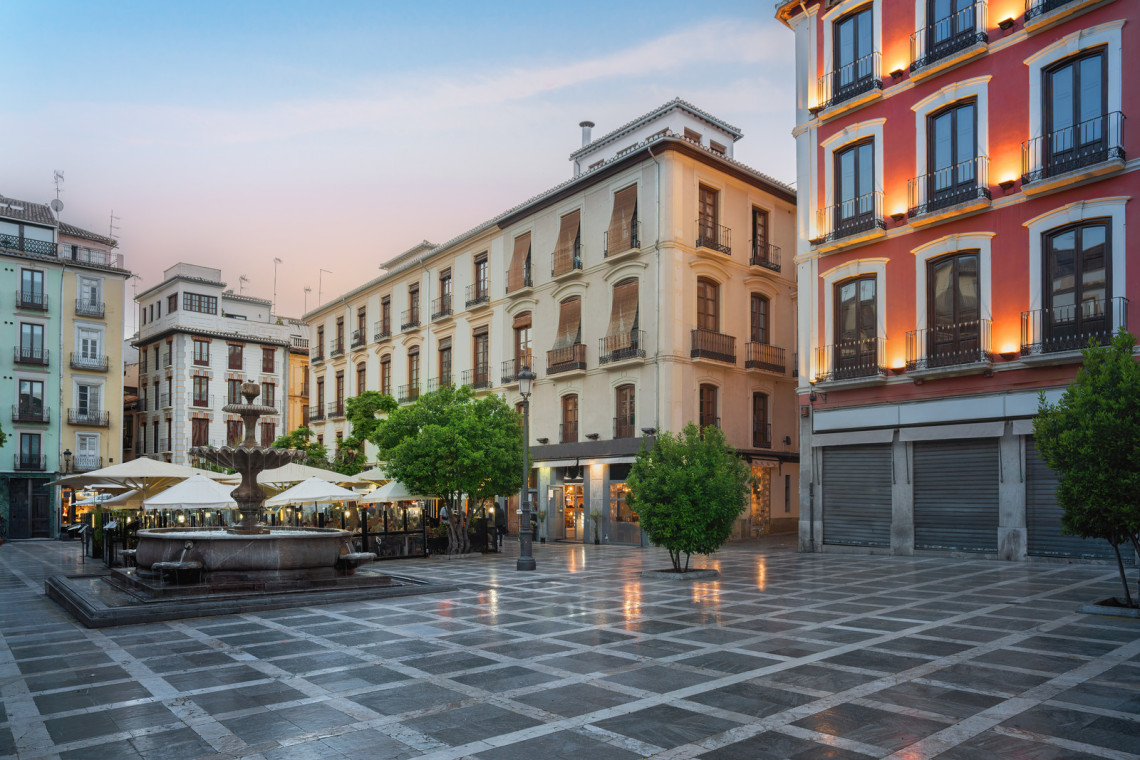 Plaza Nueva Square at Sunset - Granada, Andalusia, Spain fountain-of-plaza-nueva-square-at-sunset-granada-andalusia-spain