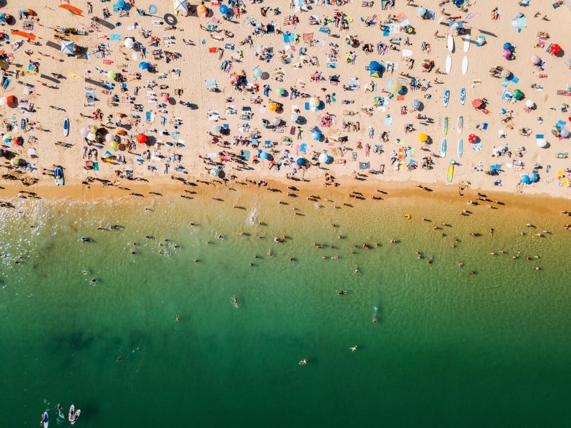 beach-in-the-algarve-aerial-view-crowed-summer-time-weather-portugal