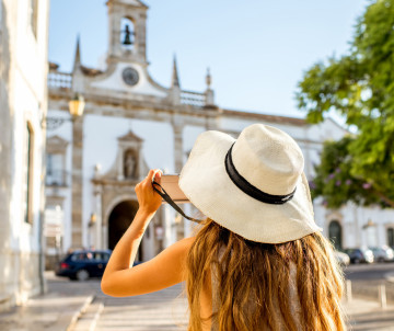 woman-traveling-in-faro-town-on-the-south-of-portugal-algarve-faro-region