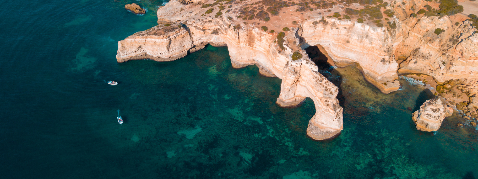 aerial-cape-senhora-da-rocha-on-shore-of-aramacao-de-pera